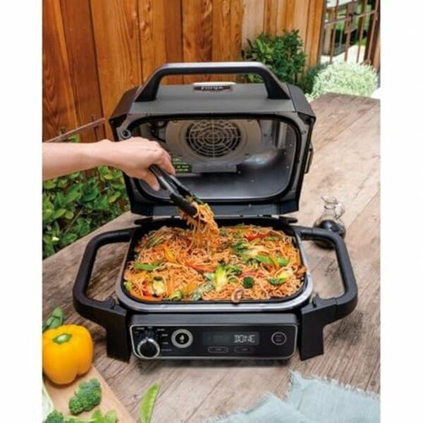 Découvrez notre avis complet sur le Ninja Woodfire OG701EU : le barbecue électrique multifonction 7 en 1 qui révolutionne vos grillades avec ses performances exceptionnelles et sa polyvalence. 